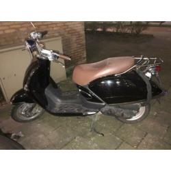 Super retro scooter met weinig km’s