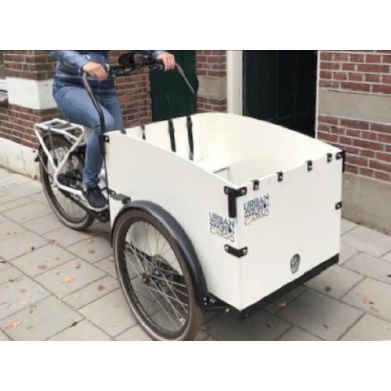 Gezocht idee oplossing om hond in bakfiets te houden bench?